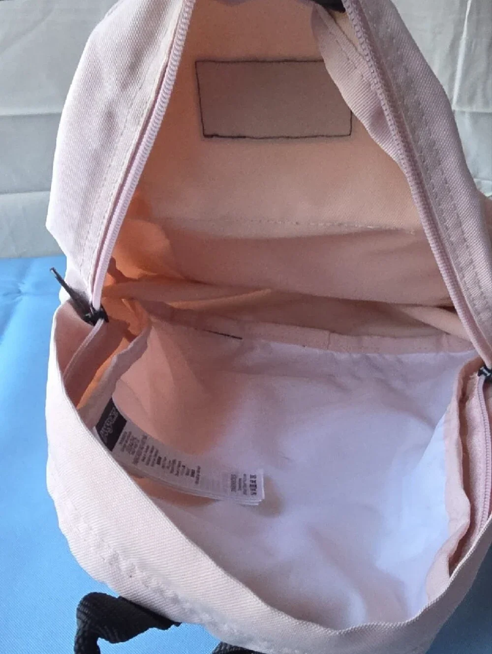 Jansport Mini Pint Backpack in Pale Misty Pink